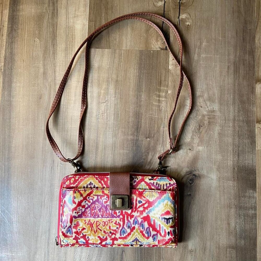Sakroots red ikat Be Brave crossbody wallet